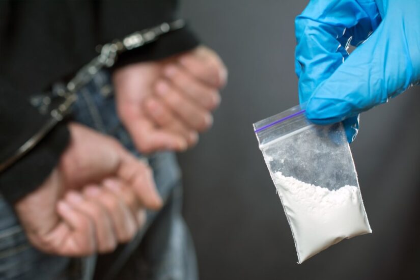 Person Holding Drugs In A Small Packet Bag
