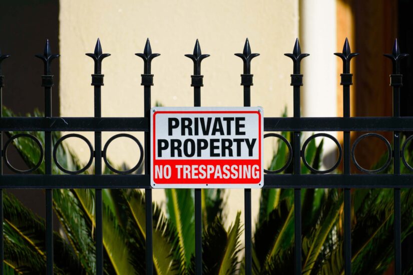 Private Property No Trespass, sign posted on a fence