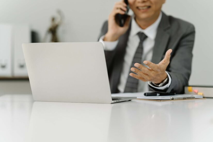 Lawyer on a phone call in his office